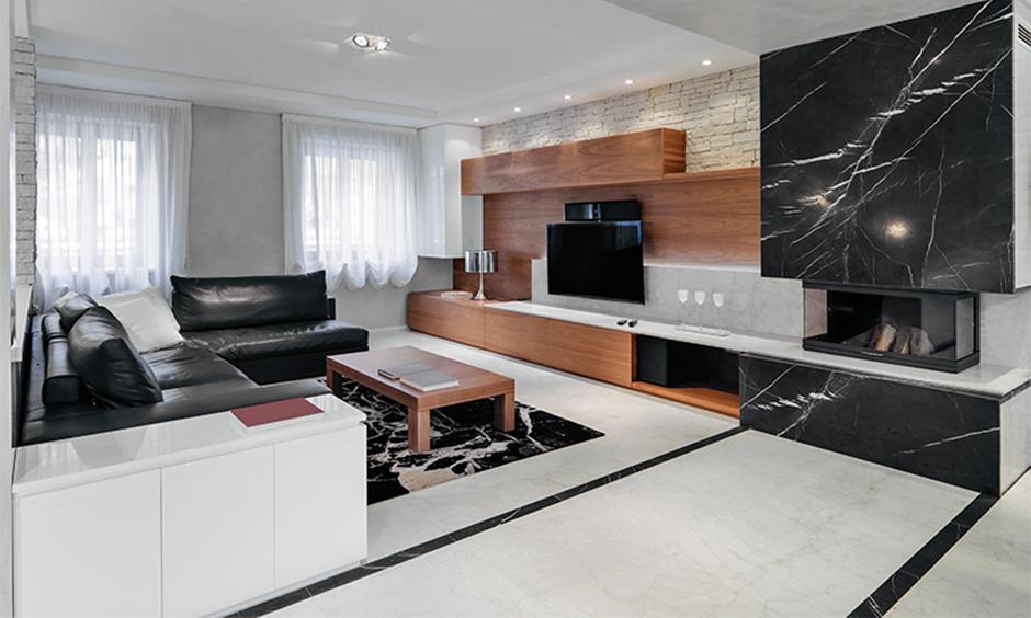 Black marble accent wall design for a bold modern living room interior