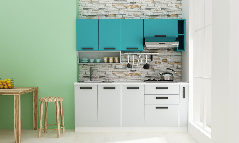 Compact biophilic modular kitchen with turquoise cabinets and stone backsplash