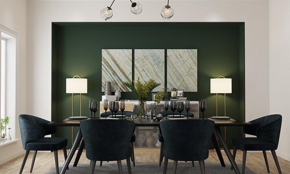 A wall painting design for dining room with a dark accent wall, adding drama and sophistication.