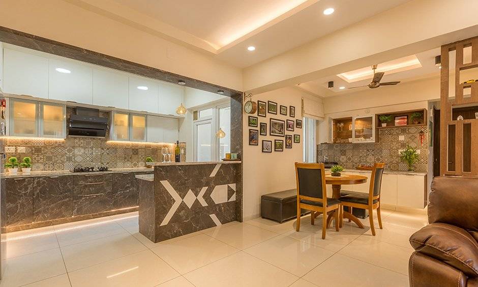 Kitchen and living room interior in Bangalore costs INR 3-4.5 lakhs for basic materials and finishes