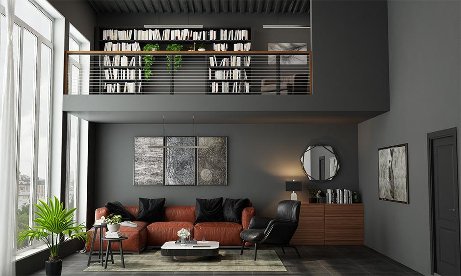 Light black living room with brown accents, plants, and loft-inspired decor