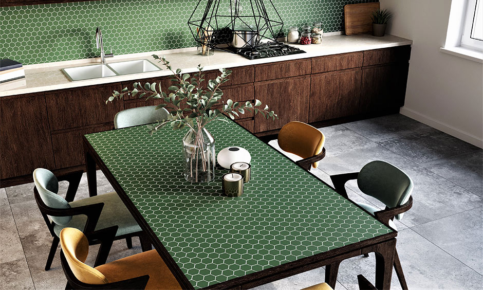 Modern biophilic kitchen with wooden cabinetry, green tiles, and indoor plants