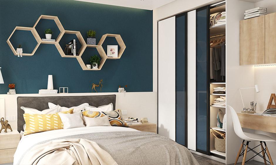 Personalised bedroom wall decor with beehive-inspired floating shelves
