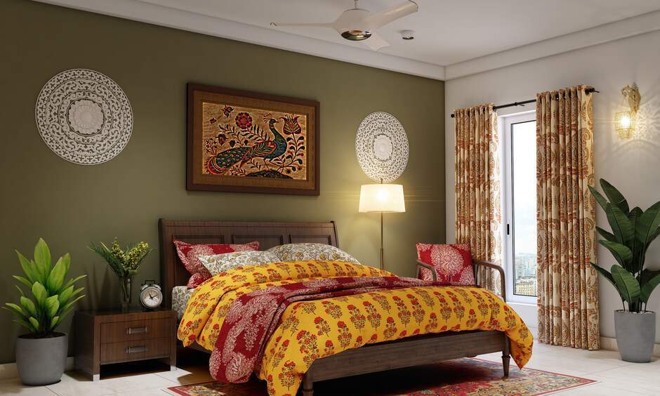 Cosy traditional bedroom design with elegant furnishings and warm colour palette.