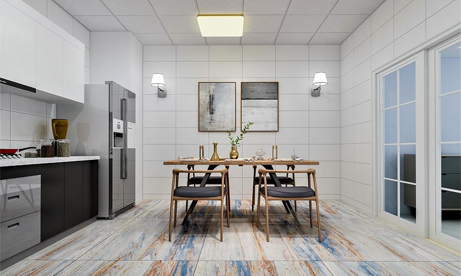 Minimalist kitchen-diner layout featuring a seamless transition with a sliding door design