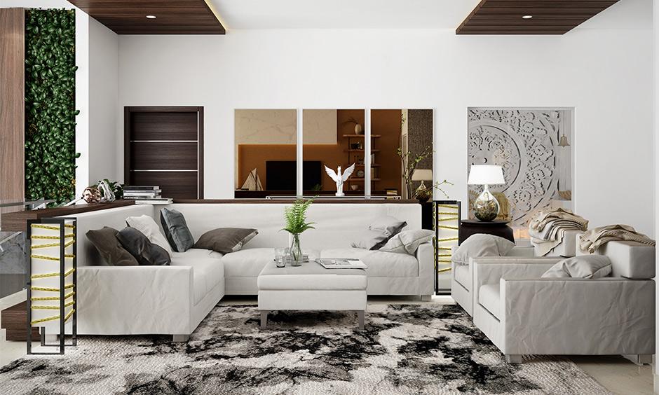 White living room with black accents and mirrors for a spacious modern look